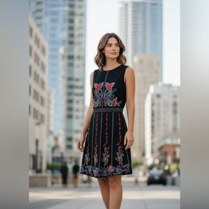 Maeve Black Dress with Red and Green detailed Embroidery. Anthropology.